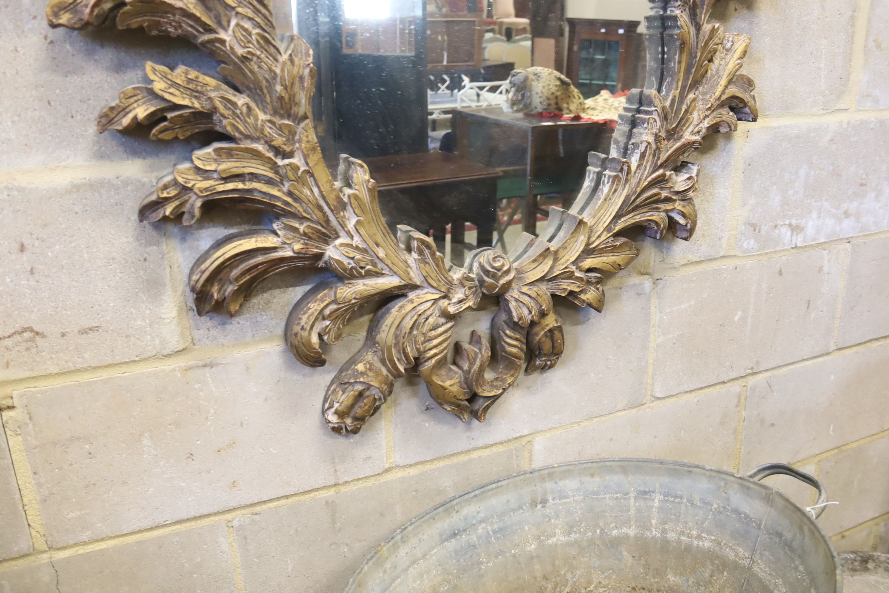 An 18th century style gilt acanthus framed wall mirror, width 100cm, height 140cm